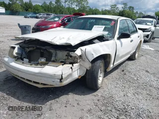 2001 Ford Crown Victoria LX z VIN 2FAFP74W81X102216, wystawiony jako IAAI lot #42388800 z przebiegiem 225 623 mil mil oraz . Historia ofert i sprzedaży dostępna na DreamBid. Obrazek 2.