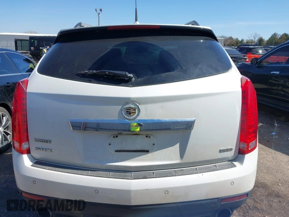 2014 Cadillac SRX Performance Collection with VIN 3GYFNCE36ES527809, listed as a IAAI auction lot 41790776 with 166,302 mi miles. Bid and sale history available at carsss.com. Image 16.