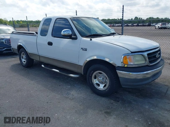 2002 Ford F-150 XL with VIN 1FTRX17242NA69697, listed as a IAAI auction lot 42038258 with 207,008 mi miles. Bid and sale history available at carsss.com. Image 1.