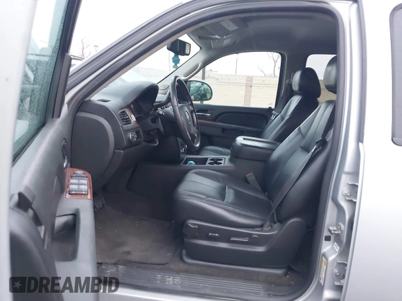 2013 GMC Yukon SLT with VIN 1GKS1CE07DR157076, listed as a IAAI auction lot 41557228 with 148,242 mi miles. Bid and sale history available at carsss.com. Image 5.