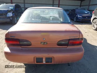 1997 Geo Prizm z VIN 1Y1SK5268VZ443044, wystawiony jako IAAI lot #41705020 z przebiegiem 94 840 mil mil oraz . Historia ofert i sprzedaży dostępna na DreamBid. Obrazek 16.