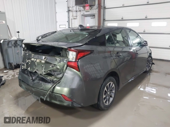2021 Toyota Prius L Eco z VIN JTDKAMFU9M3132587, wystawiony jako IAAI lot #41637275 z przebiegiem 84 203 mil mil oraz . Historia ofert i sprzedaży dostępna na DreamBid. Obrazek 4.