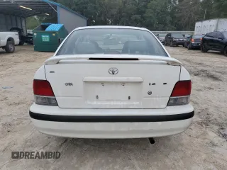 1998 Toyota Tercel DX z VIN JT2AC52L2W0307400, wystawiony jako Copart lot #80497644 z przebiegiem 72 167 mil mil oraz Czysty tytuł • Clean title. Historia ofert i sprzedaży dostępna na DreamBid. Obrazek 6.