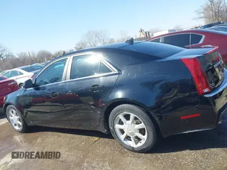 2009 Cadillac CTS AWD z VIN 1G6DH577290166448, wystawiony jako IAAI lot #41751610 z przebiegiem 158 378 mil mil oraz . Historia ofert i sprzedaży dostępna na DreamBid. Obrazek 14.
