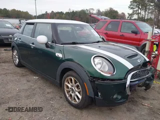 2015 MINI Hardtop 4 Door S z VIN WMWXU3C5XF2B59066, wystawiony jako IAAI lot #40900773 z przebiegiem 14 618 mil mil oraz . Historia ofert i sprzedaży dostępna na DreamBid. Obrazek 1.