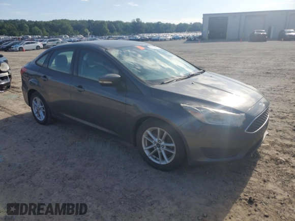 2015 Ford Focus SE with VIN 1FADP3F22FL344062, listed as a Copart auction lot 58136595 with 146,675 mi miles and Clean title. Bid and sale history available at DreamBid. Image 4.