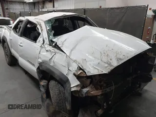 2023 Toyota Tacoma SR with VIN 3TMCZ5ANXPM652495, listed as a IAAI auction lot 42375230 with 26,736 mi miles and . Bid and sale history available at DreamBid. Image 6.