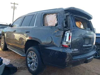 2015 GMC Yukon SLE with VIN 1GKS2AKC4FR510778, listed as a IAAI auction lot 41345528 with 159,760 mi miles. Bid and sale history available at carsss.com. Image 3.