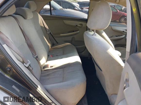 2010 Toyota Corolla with VIN 1NXBU4EE0AZ305870, listed as a IAAI auction lot 42228971 with 208,644 mi miles and . Bid and sale history available at DreamBid. Image 8.