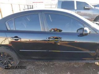 2009 Mazda 3 i Touring Value with VIN JM1BK32F591192030, listed as a IAAI auction lot 41248304 with 153,467 mi miles. Bid and sale history available at carsss.com. Image 13.