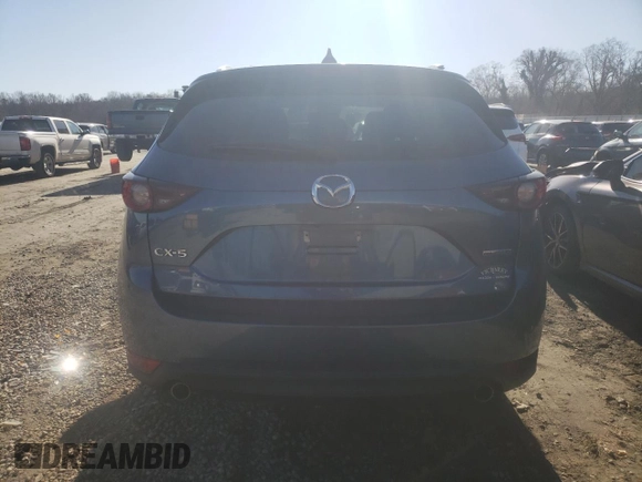 2020 Mazda CX-5 Touring with VIN JM3KFACM8L0774374, listed as a Copart auction lot 42870895 with 71,925 mi miles and Salvage Title. Bid and sale history available at DreamBid. Image 6.
