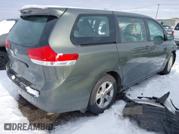 2014 Toyota Sienna L with VIN 5TDZK3DC2ES429684, listed as a IAAI auction lot 41529309 with 112,190 mi miles. Bid and sale history available at carsss.com. Image 4.
