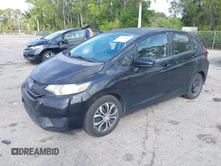 2016 Honda Fit LX with VIN JHMGK5H59GS002090, listed as a IAAI auction lot 41761887 with 97,577 mi miles. Bid and sale history available at carsss.com. Image 20.