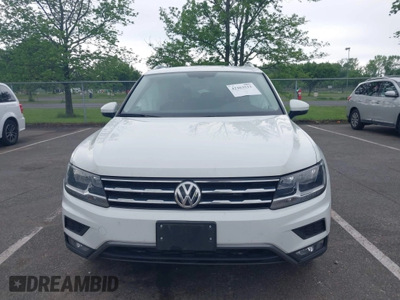 2018 Volkswagen Tiguan SEL with VIN 3VV2B7AX4JM012840, listed as a IAAI auction lot 42263511 with 105,510 mi miles and . Bid and sale history available at DreamBid. Image 12.