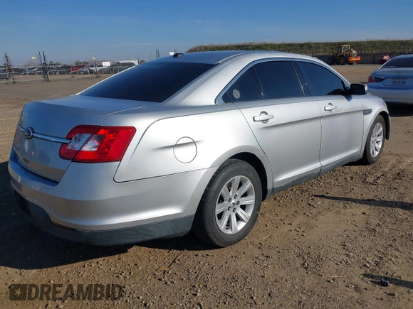 2011 Ford Taurus SE with VIN 1FAHP2DWXBG172965, listed as a IAAI auction lot 41395638 with 147,098 mi miles. Bid and sale history available at carsss.com. Image 4.