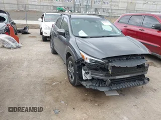 2024 Subaru Crosstrek Premium z VIN JF2GUADC7RH255435, wystawiony jako IAAI lot #42503044 z przebiegiem 21 693 mil mil oraz . Historia ofert i sprzedaży dostępna na DreamBid. Obrazek 1.