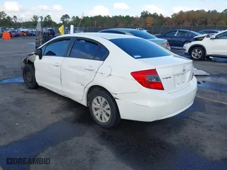 2012 Honda Civic Sdn LX with VIN 19XFB2F5XCE025289, listed as a IAAI auction lot 40777323 with 198,115 mi miles. Bid and sale history available at carsss.com. Image 3.
