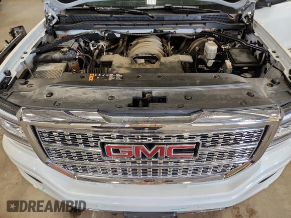 2018 GMC Sierra 1500 Denali z VIN 3GTU2PEJ2JG587157, wystawiony jako Copart lot #58516315 z przebiegiem 88 855 mil mil oraz Szkoda całkowita • Salvage title. Historia ofert i sprzedaży dostępna na DreamBid. Obrazek 11.