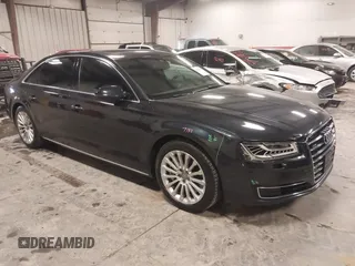 2015 Audi A8 3.0T with VIN WAU3GAFD7FN035765, listed as a IAAI auction lot 41556596 with 87,384 mi miles and . Bid and sale history available at DreamBid. Image 1.