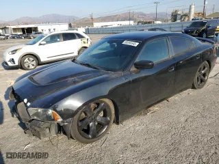 2014 Dodge Charger RT 100th Anniversary with VIN 2C3CDXCT4EH374747, listed as a Copart auction lot 89293345 with 147,125 mi miles and Salvage Title. Bid and sale history available at carsss.com. Image 1.