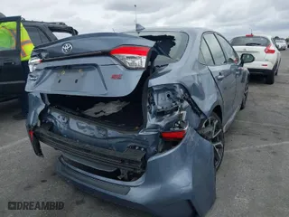 2021 Toyota Corolla SE with VIN JTDS4MCE8MJ065982, listed as a IAAI auction lot 41734972 with 59,039 mi miles. Bid and sale history available at carsss.com. Image 4.