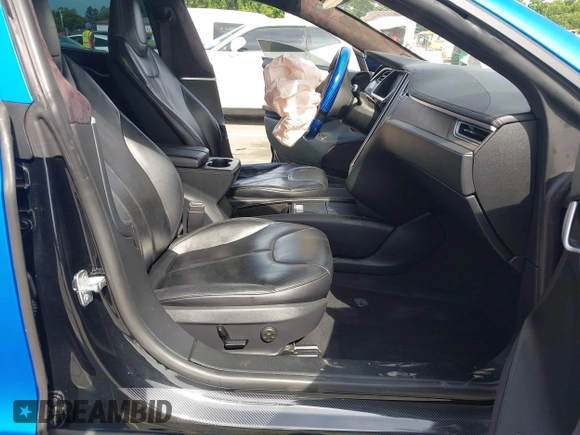 2013 Tesla Model S Performance with VIN 5YJSA1DP5DFP25345, listed as a IAAI auction lot 42288379 with 165,915 mi miles and . Bid and sale history available at DreamBid. Image 5.