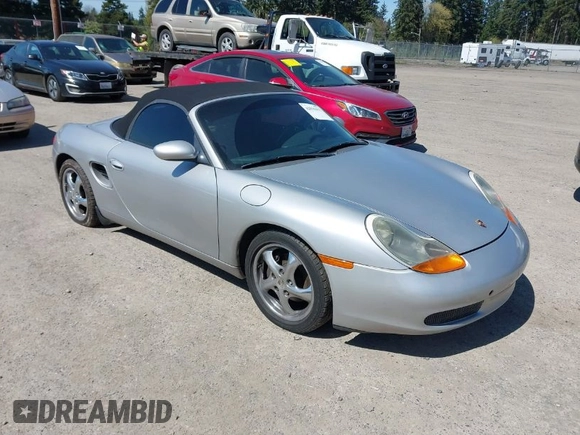 1998 Porsche Boxster с VIN WP0CA2983WU624195, выставлен на аукционе IAAI как лот 42036411 с пробегом 159 202 миль миль и . История ставок и продаж доступна на DreamBid. Изображение 1.