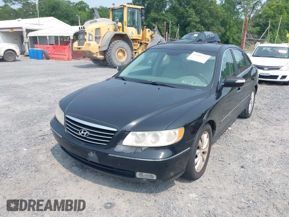 2007 Hyundai Azera SE z VIN KMHFC46F77A212057, wystawiony jako IAAI lot #42400715 z przebiegiem 191 204 mil mil oraz . Historia ofert i sprzedaży dostępna na DreamBid. Obrazek 2.