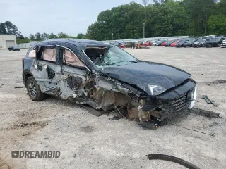 2023 Mazda CX-9 Touring z VIN JM3TCBCY5P0647237, wystawiony jako Copart lot #56338625 z przebiegiem Nie podano mil oraz Szkoda całkowita • Salvage title. Historia ofert i sprzedaży dostępna na DreamBid. Obrazek 4.
