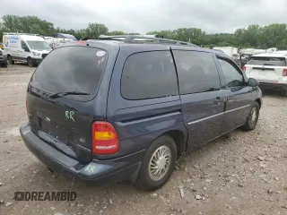 1998 Ford Windstar LX with VIN 2FMZA5146WBC36500, listed as a Copart auction lot 57662025 with 143,017 mi miles and Salvage title. Bid and sale history available at DreamBid. Image 3.