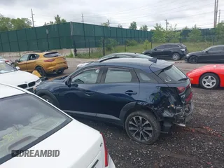 2019 Mazda CX-3 Touring z VIN JM1DKFC76K0446440, wystawiony jako IAAI lot #42314401 z przebiegiem 57 901 mil mil oraz . Historia ofert i sprzedaży dostępna na DreamBid. Obrazek 14.