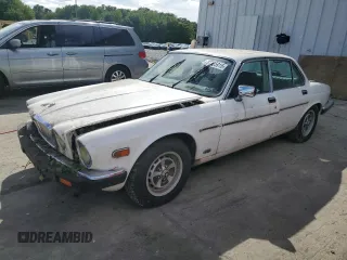 1986 Jaguar XJ with VIN SAJAV1346GC461014, listed as a Copart auction lot 57785915 with 53,433 mi miles and Clean title. Bid and sale history available at DreamBid. Image 1.