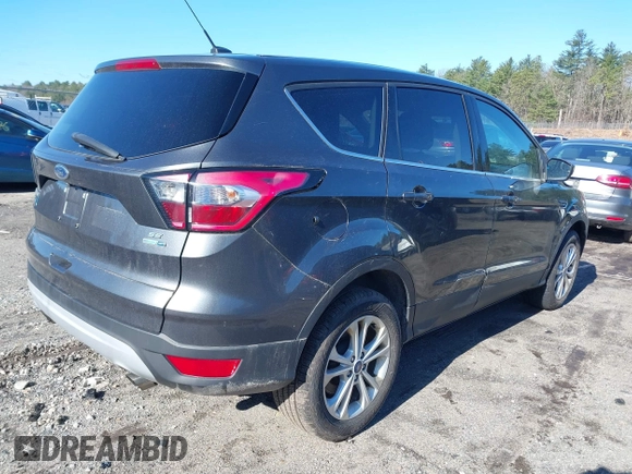 2017 Ford Escape SE with VIN 1FMCU9GD6HUC70333, listed as a IAAI auction lot 41920087 with 67,441 mi miles. Bid and sale history available at carsss.com. Image 4.