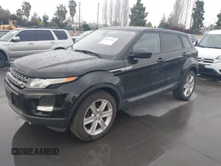 2014 Land Rover Range Rover Evoque Pure Plus z VIN SALVP2BG6EH903004, wystawiony jako IAAI lot #41923386 z przebiegiem 132 520 mil mil oraz . Historia ofert i sprzedaży dostępna na DreamBid. Obrazek 2.