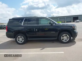 2019 Chevrolet Tahoe LT z VIN 1GNSKBKC6KR266831, wystawiony jako IAAI lot #42174593 z przebiegiem 103 199 mil mil oraz . Historia ofert i sprzedaży dostępna na DreamBid. Obrazek 13.