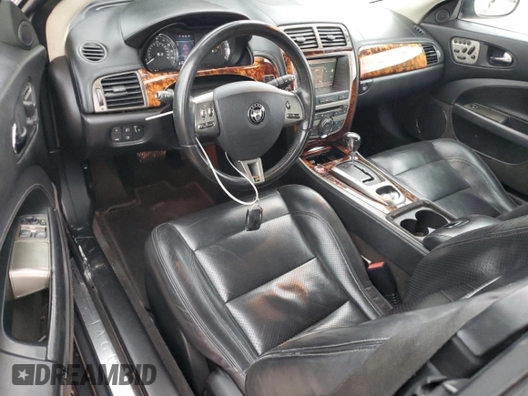2007 Jaguar XK XKR with VIN SAJWA44C879B19251, listed as a Copart auction lot 50807595 with 100,715 mi miles and Salvage Title. Bid and sale history available at DreamBid. Image 8.