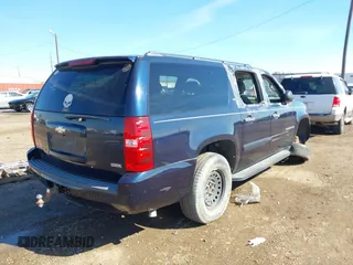 2009 Chevrolet Suburban LS z VIN 1GNFC16029R200974, wystawiony jako IAAI lot #41370873 z przebiegiem 207 649 mil mil oraz . Historia ofert i sprzedaży dostępna na DreamBid. Obrazek 4.