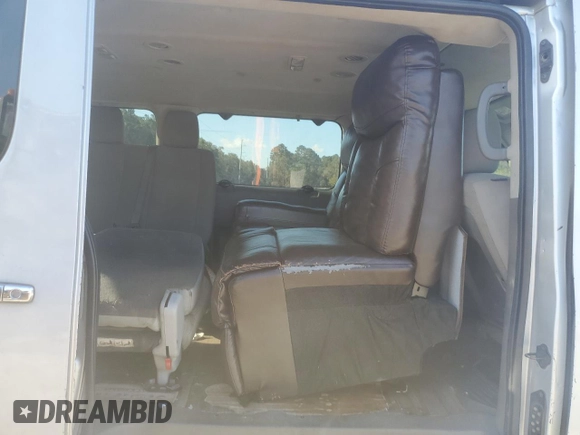 2012 Nissan NV SV z VIN 5BZBF0AA0CN200558, wystawiony jako Copart lot #77629944 z przebiegiem 174 152 mil mil oraz Szkoda całkowita • Salvage title. Historia ofert i sprzedaży dostępna na DreamBid. Obrazek 11.