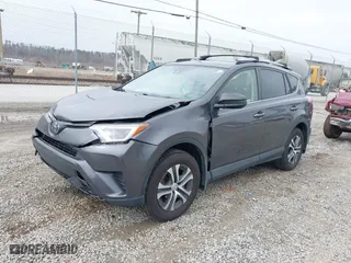 2018 Toyota RAV4 LE with VIN JTMBFREV2JJ727457, listed as a IAAI auction lot 41758208 with 65,740 mi miles. Bid and sale history available at carsss.com. Image 2.