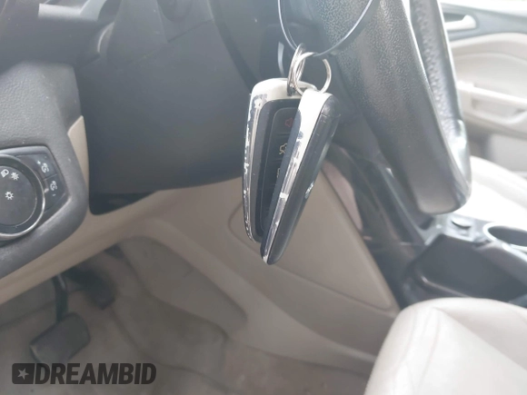 2014 Ford Escape Titanium with VIN 1FMCU9JX9EUB23972, listed as a IAAI auction lot 42217298 with 164,556 mi miles and . Bid and sale history available at DreamBid. Image 11.