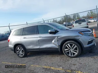 2016 Honda Pilot Touring with VIN 5FNYF6H90GB024902, listed as a IAAI auction lot 41948563 with 148,598 mi miles. Bid and sale history available at carsss.com. Image 13.