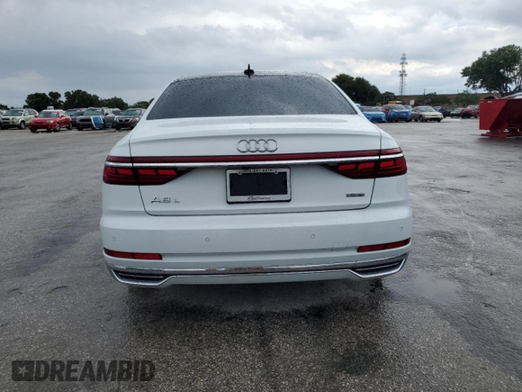 2019 Audi A8 z VIN WAU8DAF88KN004066, wystawiony jako Copart lot #56928395 z przebiegiem 93 157 mil mil oraz Czysty tytuł • Clean title. Historia ofert i sprzedaży dostępna na DreamBid. Obrazek 6.