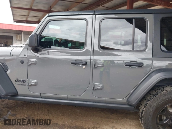 2020 Jeep Wrangler Unlimited Black and Tan с VIN 1C4HJXDG3LW266615, выставлен на аукционе IAAI как лот 42207899 с пробегом 55 291 миль миль и . История ставок и продаж доступна на DreamBid. Изображение 14.