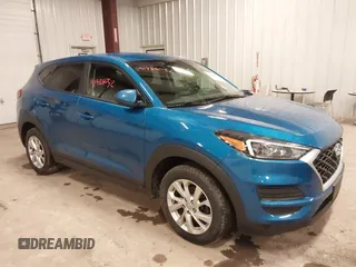 2019 Hyundai Tucson SE with VIN KM8J2CA48KU027746, listed as a IAAI auction lot 41986052 with 93,261 mi miles. Bid and sale history available at carsss.com. Image 1.