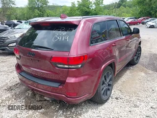 2017 Jeep Grand Cherokee Altitude with VIN 1C4RJFAG0HC700419, listed as a IAAI auction lot 42553449 with 143,872 mi miles and . Bid and sale history available at DreamBid. Image 4.