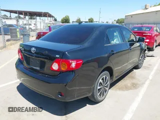 2010 Toyota Corolla with VIN 1NXBU4EE3AZ307385, listed as a IAAI auction lot 42465219 with 201,105 mi miles and . Bid and sale history available at DreamBid. Image 4.
