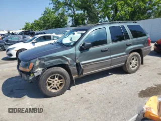 2002 Jeep Grand Cherokee Laredo с VIN 1J4GW48S02C174656, выставлен на аукционе Copart как лот 56954155 с пробегом 235 427 миль миль и Списание • Salvage title. История ставок и продаж доступна на DreamBid. Изображение 1.
