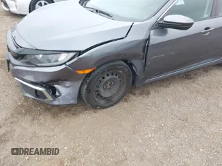 2020 Honda Civic LX with VIN 2HGFC2F63LH567698, listed as a IAAI auction lot 42354886 with 70,977 mi miles and . Bid and sale history available at DreamBid. Image 6.