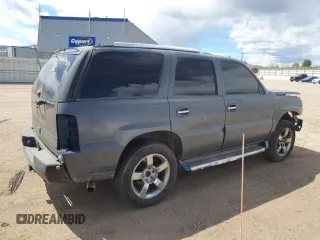 2005 Cadillac Escalade z VIN 1GYEK63N15R156958, wystawiony jako Copart lot #55286165 z przebiegiem Nie podano mil oraz Czysty tytuł • Clean title. Historia ofert i sprzedaży dostępna na DreamBid. Obrazek 3.