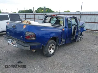 1998 Ford F-150 XL with VIN 2FTZX0722WCA65198, listed as a IAAI auction lot 42145451 with 188,529 mi miles and . Bid and sale history available at DreamBid. Image 4.